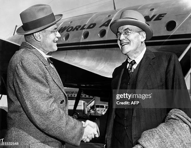 John Foster Dulles , Republican Party Foreign policy expert is greeted by his brother, Allan Dulles, as he arrives 04 October 1948 in New York. J. F....