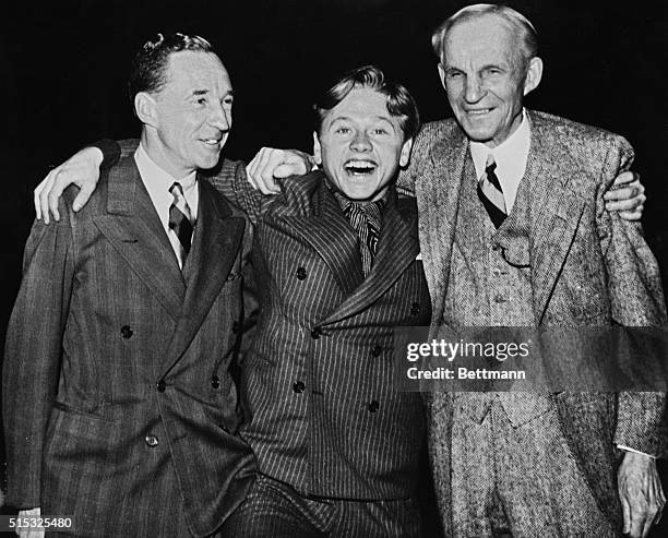 The irrepressible Mickey Rooney hoyden of the movies' younger set, didn't even restrain his emotions when he met the Fords, Henry and Edsel, during a...