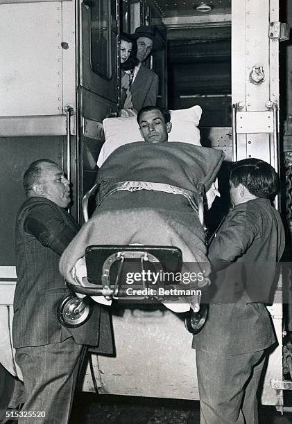 Golf champion Ben Hogan is lifted from a train which brought him to his home town to recuperate from a near fatal auto accident. He was hospitalized...