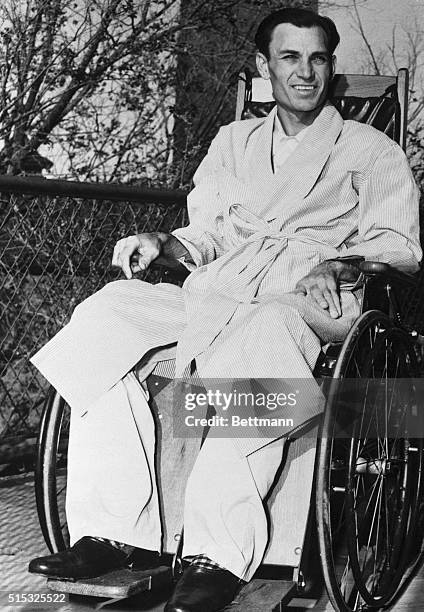 Frail but smiling, champion golfer Ben Hogan relaxes in the sunshine in a wheelchair at the Hotel Dieu Hospital as he recovers from a near fatal auto...