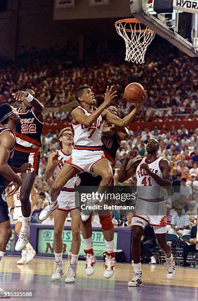 Phoenix: Phoenix Suns Kevin Johnson flies to the basket in first quarter of the Suns-Portland Trail Blazers 4th playoff game.