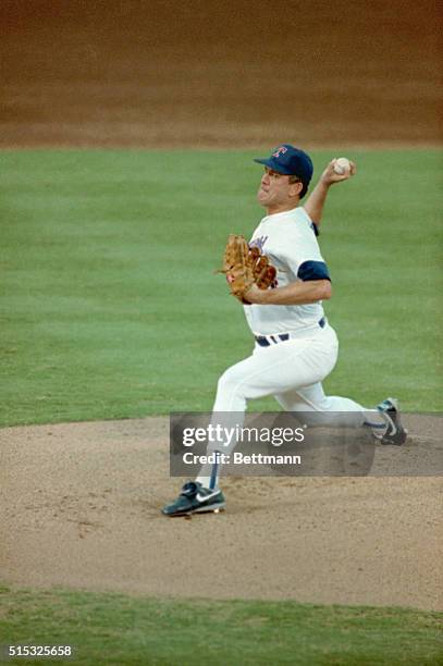 Arlington, Texas: With help from the bullpen 8/22 Nolan Ryan, shown pitching against the Seattle Mariners, moved to 18th on the all-time win list by...