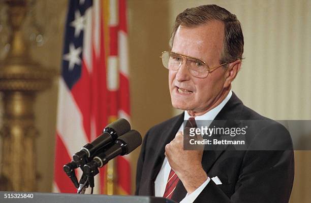 Washington: President Bush addresses the nation in a news conference from the White House.