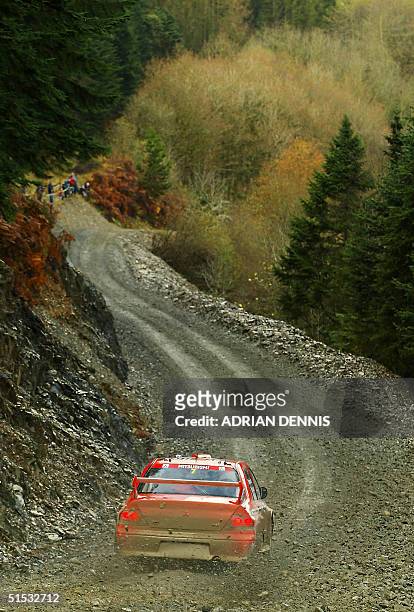 Francois Delecour of France, in his Mitsubishi Lancer Evolution World Rally Car on the special stage 5 in the Trawscoed Forest of the Network Q rally...