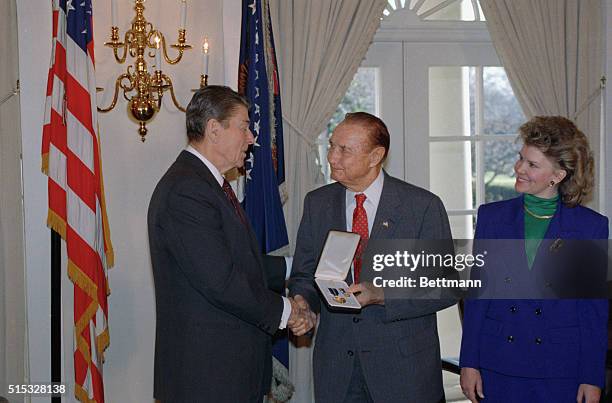 Washington, DC: President Reagan honors Senator Strom Thurmond of South Carolina with a Presidential Citizens Medal in a White House ceremony January...