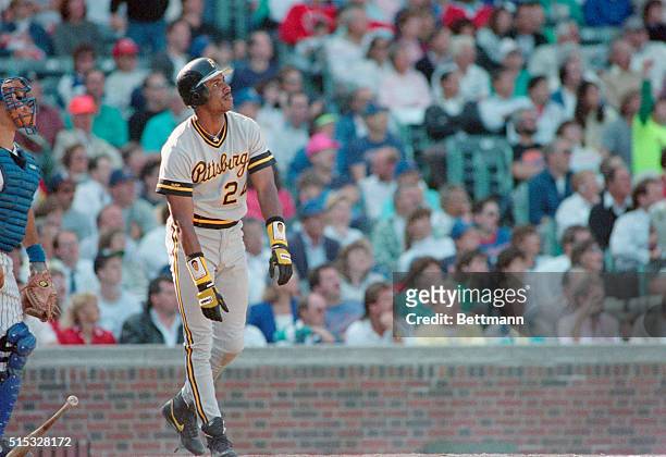 Pirates' Barry Bonds stands at home plate and watches his 32nd homer sail into the stands in 8th inning 9/20. Bonds now has hit more homers than any...