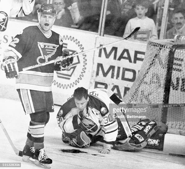 Buffalo Sabres Goal tender Clint Malarchuk grasps his throat after suffering a serious neck laceration. The life threatening injury was caused when...