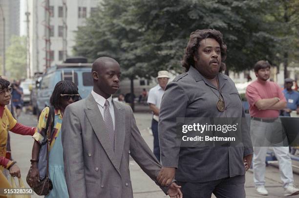 Antron McCray , accused in the case of the rape and beating of a Central Park jogger, walks to the the Manhattan Supreme Court with civil rights...