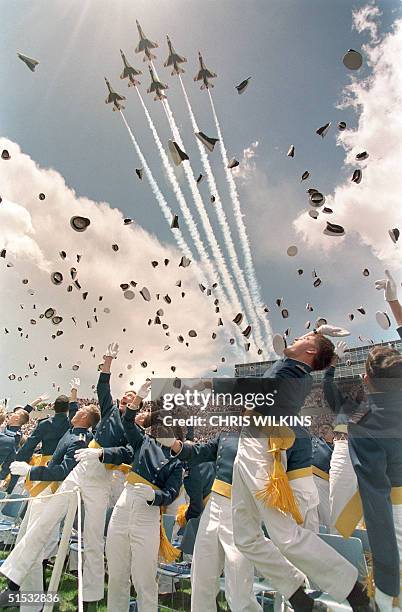 The US Air Forces Thunderbirds jetfighters perform a flyover as graduates of the class of 1995 of the US Air Force Academy in Colorado Springs, CO,...