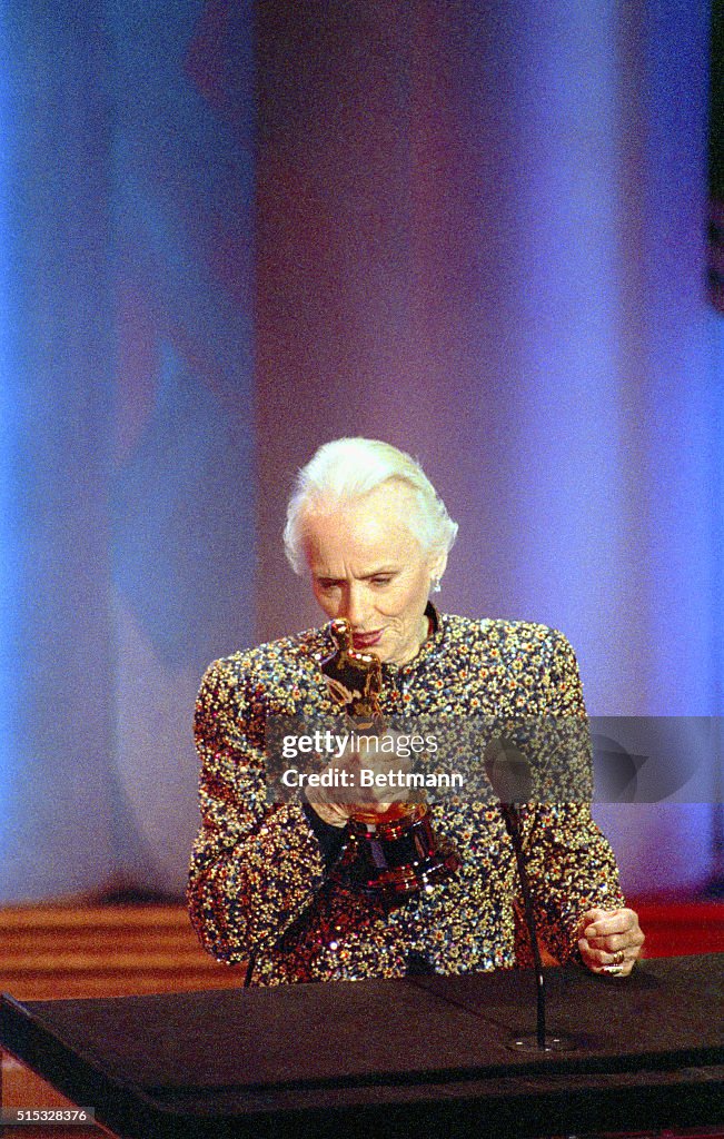 Jessica Tandy Holding Oscar Award in Disbelief