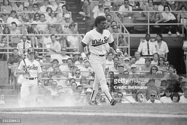 White Sox's Sammy Sosa almost goes down after being hit by a pitch thrown by a California's Joe Grahe in the sixth inning of game, August 26. Sosa...