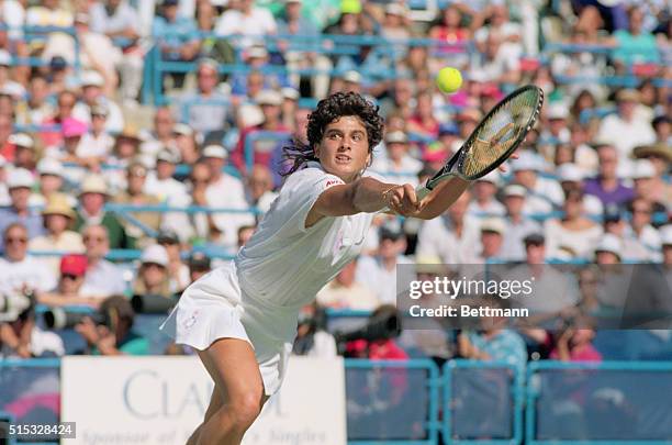 Gabriela Sabatini stretches for a shot during her US Open final match with Steffi Graf.