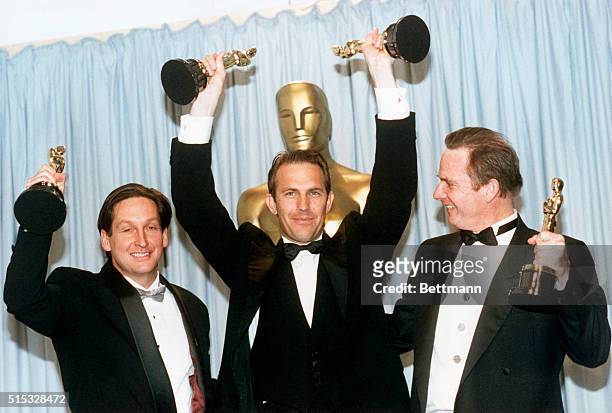 Kevin Costner and Jim Wilson , won the Best Picture Oscar for Dances with Wolves , which they co-produced. Costner also won Best Director for the...