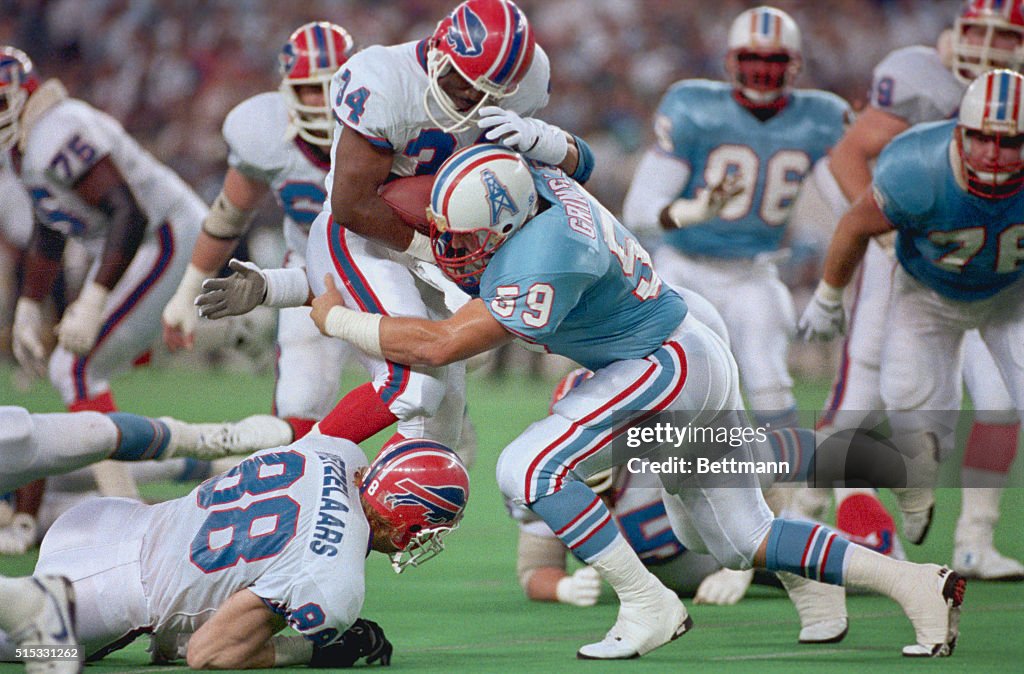 John Grimsley Tackling Thurman Thomas