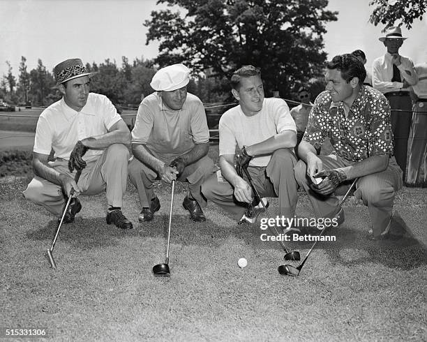 Talking over the course before driving off in a practice round are Sammy Snead, White Sulphur Springs, West Virginia; Herman Barron, White Plains,...