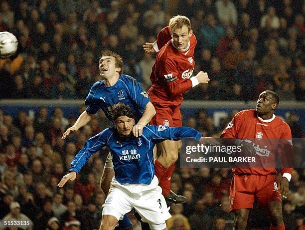 Liverpool's Sami Hypia attempts a good header on goal during their Derby premiership game against Everton 22 December 2002. AFP photo by Paul Barker