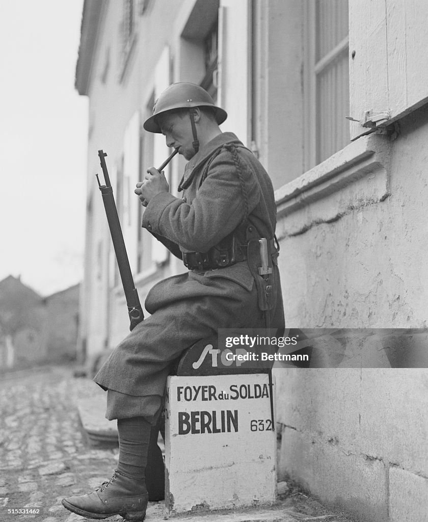 Soldier Lighting His Pipe