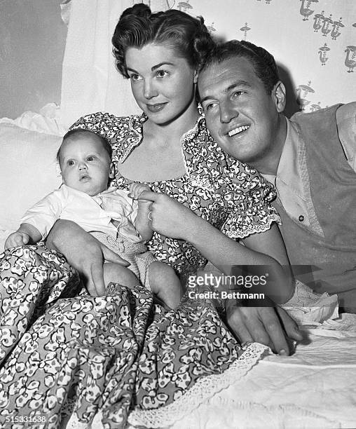 Movie actress Esther Williams and her husband, radio and television actor Ben Gage, pose for their first pictures with their two-year-old son,...