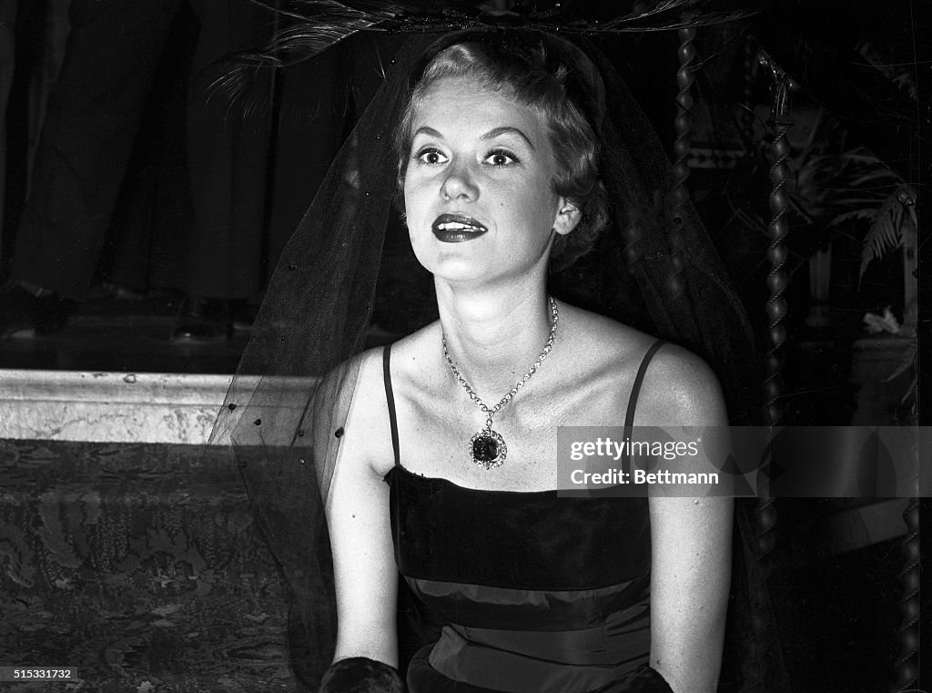 Woman Wears Hope Diamond at Party