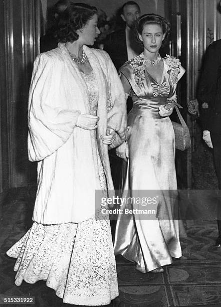 Princess Elizabeth and Princess Margaret Rose shown on their arrival at the Theater.