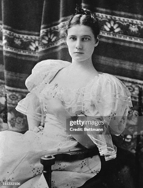 Here is a formal portrait of Nellie Bly , an American journalist and around the world traveler.