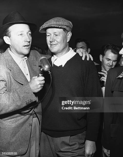 Byron is the Winner! Pebble Beach, California: Crooner Bing Crosby congratulates Byron Nelson after he won top spot in the Pro Division of the...