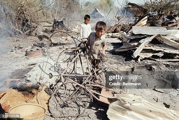 Thanh Phuoc Village, Vietnam: Civilians 50 km northwest of Saigon collecting their belongings after the Viet Cong left their village. Photo shows a...