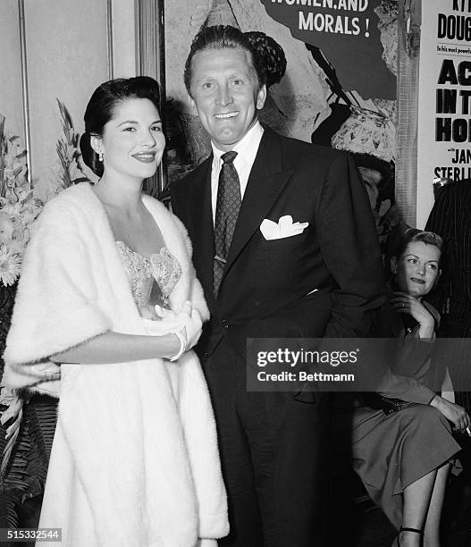Wedding Bells soon? Screen actor Kirk Douglas and socialite Irene Wrightsman McEnvoy. It has been rumored the two may wed soon.