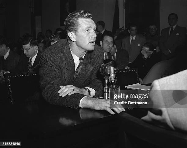 Film actor Sterling Hayden, a Marine hero during World War II, testifies before the House Un-American activities committee, April 10 in Washington,...