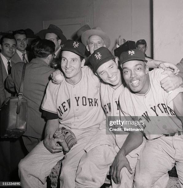 Jubilant Giants sit in their dressing room smiling through their fatigue after winning with 3-1 the first game of the pennant play off with the...