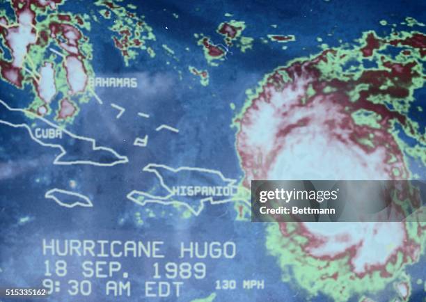 Miami: Hurricane Hugo is shown as a 10:30 am color satellite photo . Hugo has sustained winds of 105 mph and is moving to the northwest at 12 mph...