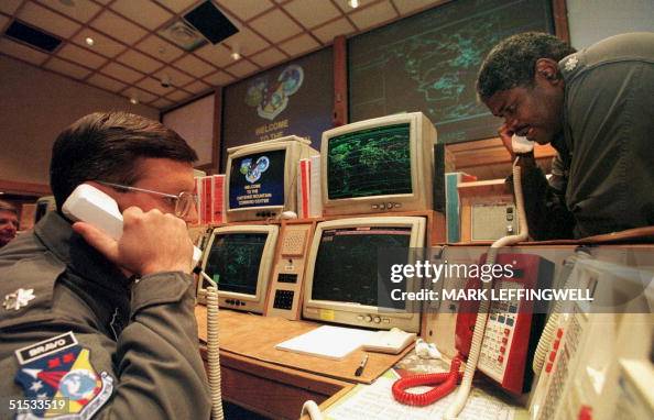 Missile Commanders Lt. and Lt. Col. Ken Reed confirm a launch warning ...