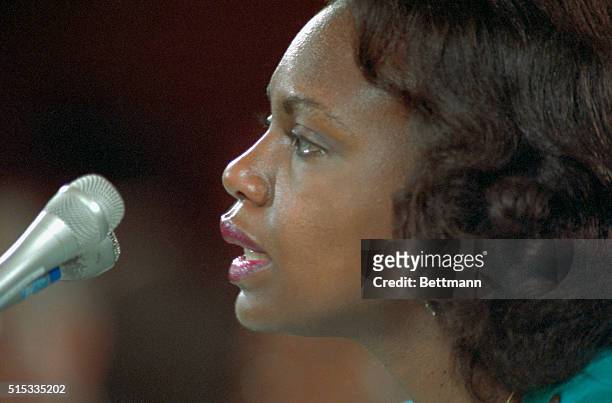 Washington, D.C.: Anita Hill testifies before the Senate Judiciary Committee on Capitol Hill. Includes tight closeup of Professor Hill, as well as...