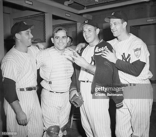 Happy foursome gathers in the Yankee dressing room after the 8-0 victory over the Red Sox, a triumphant no-hitter for Allie Reynolds, September 28....