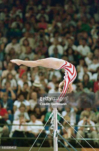 Mary Lou Retton performing on the uneven bars in Los Angeles.