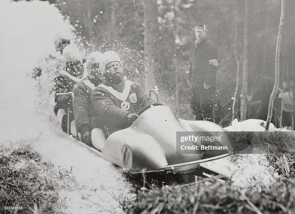 Men in Sled in Action