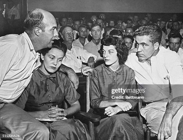 Mr. And Mrs. J.W. Milan and Mr. And Mrs. Roy Bryant during trial.