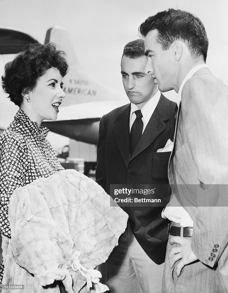 Elizabeth Taylor, Howard Taylor and Montgomery Clift
