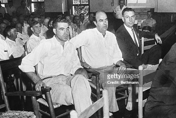 Half-brothers Roy Bryant and J. W. Milam sit with an attorney as they go on trial Sept. 19th for the murder of 14-year-old negro Emmett Till of...