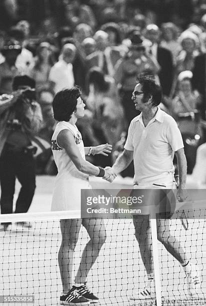 Bobby Riggs and Billie Jean King shake hands after Mrs. King defeated Riggs in straight sets to win the so-called "battle of the sexes" at the...