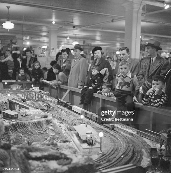 Children in Store Looking at Toy Trains Children in Store Looking at Toy Trains