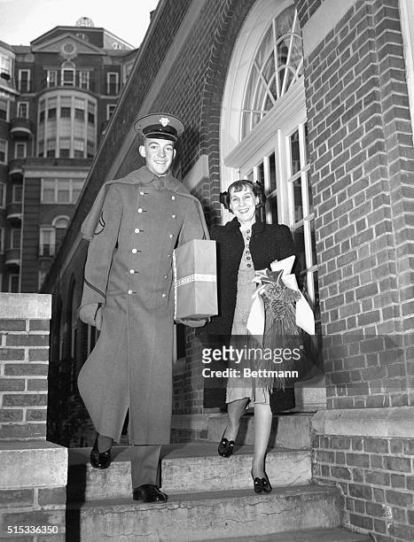 Cadet John Eisenhower, the son of General Eisenhower, and his mother Mamie are off to do some Christmas shopping while John is away from West Point.