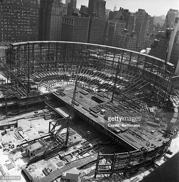 This is the impressive view as the new Madison Square Garden begins to rise over Pennsylvania Station. The last of the old station's elegant...