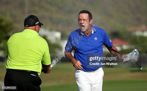 Scott Hend of Australia is sprayed with champagne after winning during the final round on day four of the Thailand Classic at Black Mountain Golf...