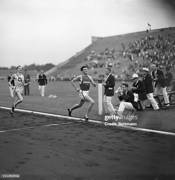 Louis Zamperini, of the University of Southern California freshmen, is shown winning the two mile run at the fourth annual Princeton Invitation Track...