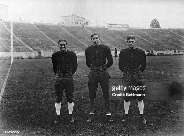 Armin Waugh, back, "Catfish" Smith, end and Johnny Davidson, back, members of the 1930 Georgia football team, before their game against NYU in New...