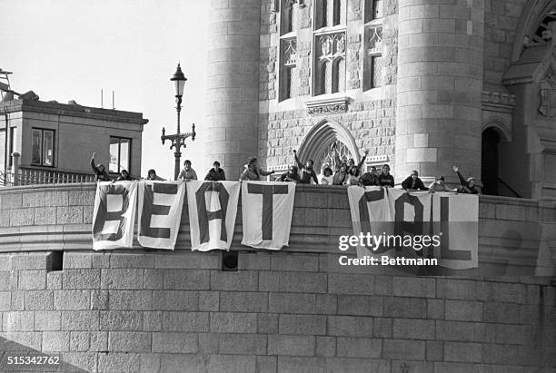 An American football rivalry reaches the banks of the Thames 11/19 as students from the Stanford University program in Britain hang the sign ?BEAT...