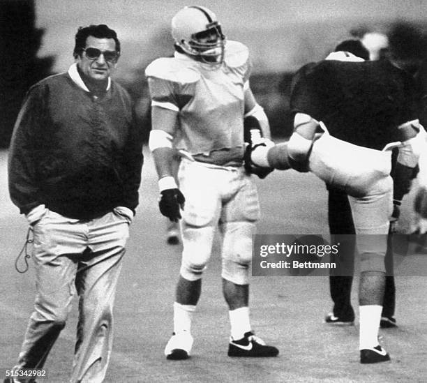 Joe Paterno is UPI's 1982 coach of the year. Paterno is shown as he drills his Penn State team at practice in preparation for their New Years Sugar...