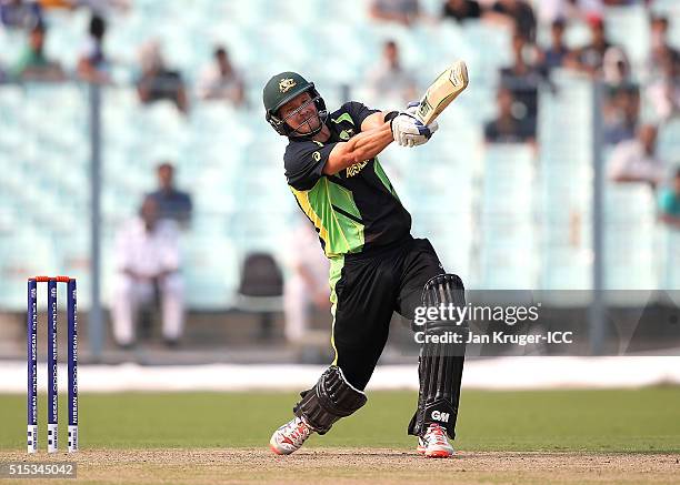 Shane Watson of Australia hits out during the ICC Twenty20 World Cup warm up match between Australia and West Indies at Eden Gardens on March 13,...