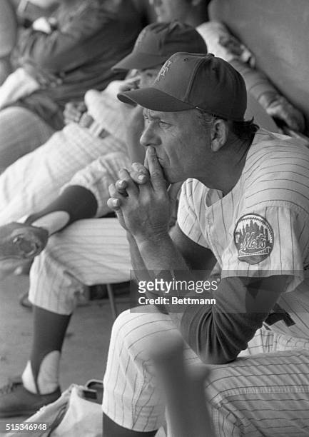 Gil Hodges, New York Mets manager, appears to be deep in thought as he watches his team play the Detroit Tigers in an exhibition game here March 18....